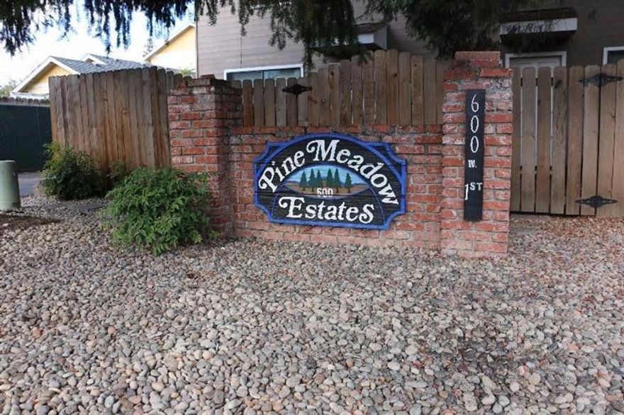 Great first time home or perfect investment property. This Pine Meadows Estates Condo is nicely updated with the living room and kitchen on entry level and 2 bedrooms and 1 bath upstairs. $175 HOA fee/mo includes: water, sewer, trash, exterior maintenance and landscaping. Conveniently located next to Phoenix Library, close to schools and shopping. 10+ year steady rental history and income.