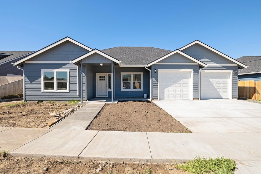 Come view this beautiful four-bedroom, two-bathroom new construction home in Phoenix! Inside the home you will find a thoughtfully designed floor plan featuring three bedrooms near the front of the home and the primary home in the back. You will love the spacious laundry room with built in storage space. The gorgeous kitchen comes complete with a large granite island and upgraded cabinetry. You will have plenty of space in the living room which features a gas fireplace and vaulted ceilings. The outside of the home has two separate covered porches that will look out onto your landscaped backyard.  You will also love the oversized two-car garage and small RV parking on the side of the home. Call today for a tour!
