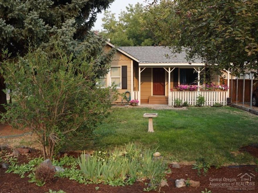 Adorable, very well maintained home close to the heart of town. This 2 bedroom 1 bath home has wonderful charm with its cottage feel breakfast nook, original hardwood flooring in areas and mature landscaping.