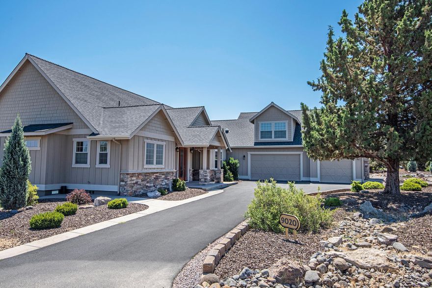 Custom Eagle Crest home, with these features:
Three separate suites plus office/den.
Quality throughout with custom cabinets,  2 double fireplaces and granite counter tops.
private setting with deck, patio and courtyard.
Lovely landscaped yard has water feature.
2200 square-foot RV garage has work shop and three car parking. This beautiful home is located across from BLM trail system.