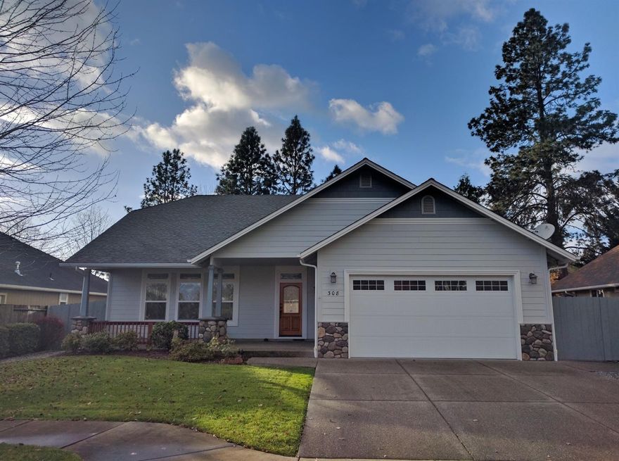 Clean, attractive and move-in ready 2006 Chapman Construction home in attractive tree lined River Road Subdivision. Large bright and open kitchen with dining area combo, breakfast bar, granite counters, large windows and door out to covered patio. Additional features include vaulted ceilings, arch ways, lighted plant shelves, crown molding, indirect lighting, warm wood floors, and shuttered blinds. Spacious master suite with double sinks, walk-in closet and door to covered patio. Nice utility room with lots of cabinets and large sink. Covered patio looks out over nicely landscaped fenced yard with automatic inground drip and sprinkler systems. 2 car attached finished garage.