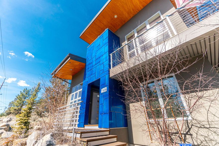 Step into a striking architectural masterpiece just blocks from downtown Bend, Newport Market, Drake Park, and the vibrant Galveston corridor—designed for those who appreciate both urban energy and natural beauty. This modern-industrial home blends concrete, stone, and wood, creating a harmonious mix of form and function. Inside, the open-concept layout showcases clean lines and premium finishes, including a Sub-Zero fridge, Wolf range, Asko dishwasher, radiant floor heating, LED lighting, and high-efficiency HVAC system. After a day of exploring, unwind in this serene, stylish space, enhanced by steel accents and natural elements. The expansive three-car garage, with commercial-grade insulated doors and epoxy flooring, offers ample storage for gear and a home gym. Whether you're seeking a modern basecamp or high-performance home, this property strikes the perfect balance of design, function, and location.