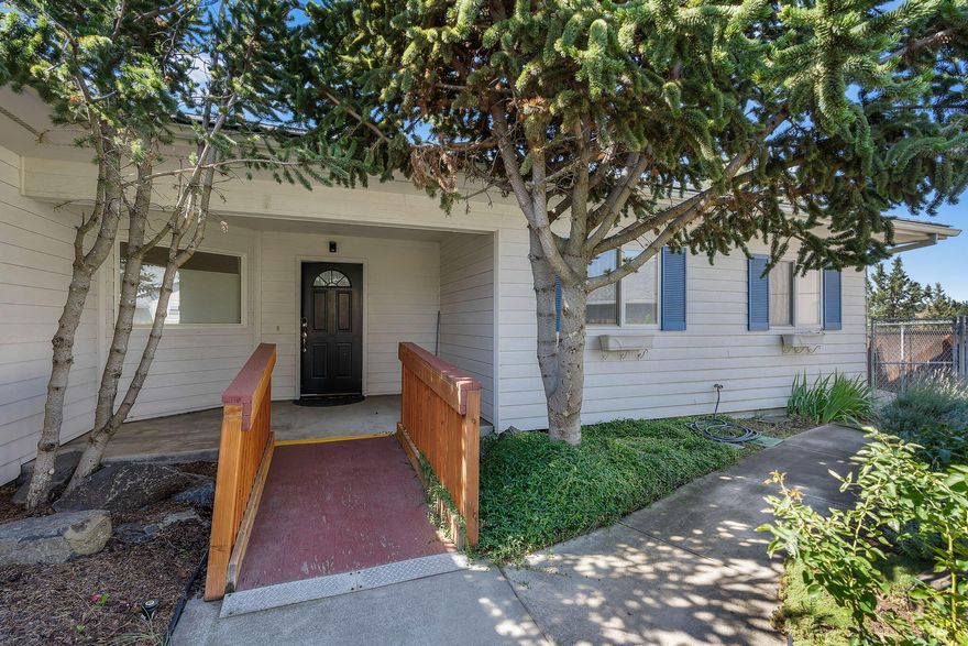 This well maintained home as an assumable VA loan of 2.5%! The 1804 square feet provides a comfortable living space in so many ways:  A large deck that is accessible from both the living room and primary bedroom, an oversized living/great room with gas fireplace, a breakfast nook that has another small private deck just outside a sliding door, a fenced back yard with thoughtful landscaping, and a paved driveway that provides approximately 900 square feet of off street parking. This is a nice home.