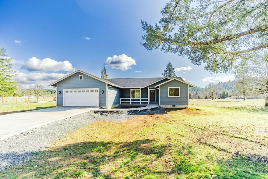 Back on market at no fault of property, buyer couldn't perform! Beautiful new construction close to the center of Cave Junction. Home features double vanity in master bathroom, granite counter tops throughout, vaulted ceilings, large kitchen island, tiled shower in the master with shower/tub combo in the guest bath. Vinyl planking in kitchen/hallways, Maytag appliances (dishwasher, oven, microwave, refrigerator), Tempstar HVAC system. Large lot provides plenty of space for entertaining, gardening, and play! So much potential to create your own back yard oasis. Photos showing furniture are digitally staged and are intended for illustration purposes only.