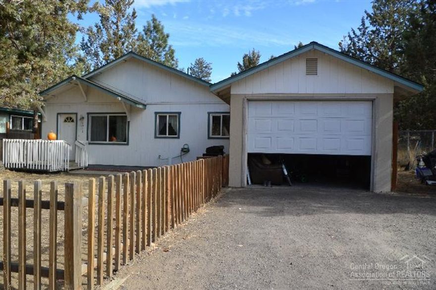 This single level home is located in NW Bend just two blocks from the Deschutes River, First Street Rapids Park and the River Trail. Easy access to downtown, the Old Mill District, shopping and the park way. Features include a large .19 acre fenced lot, 4 bedrooms, 2 bathrooms, single car attached garage and boat/RV parking. Ready for your personal touch to call this place home.