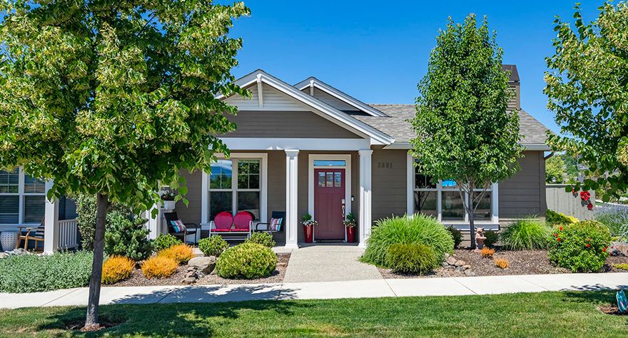 Summerfield cottage with unobstructed views of the South Mountains.  One-of-a-kind, custom designed floor plan to maximize views for this location.  Premier, corner lot location across from designated wetlands which will preserve the views.  Open layout with large island kitchen.  The great room has views and great natural light.  Built-ins surround the gas fireplace.  Open dining room with built-in cabinets and a cute bench seat.  The vaulted ceilings create a spacious and inviting atmosphere.  Private, covered, courtyard patio.  Fully fenced and landscaped. Near the Summerfield Neighborhood Park.  Earth Advantage Platinum certified for energy efficiency.  Sink in the garage.