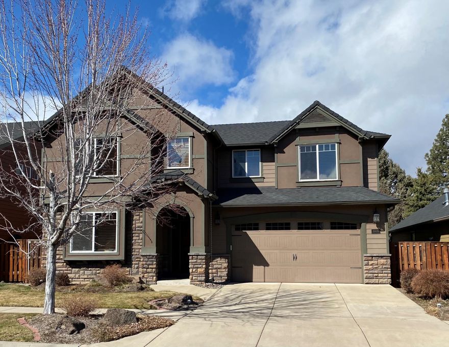 Stunning Pahlisch Home! This open floor plan features a guest room and full bath on the main. Spacious well appointed kitchen with eating bar, pantry and stainless steel appliances Upgrades galore, expansive tile floors, plush carpet, rich colors and finishes. Fireplace w/masonry surround and built ins. Upstairs has large master w/jetted tub, shower,  2 sinks and large walk-in closet. Three more large bedroom, one could be used as a bonus room, laundry w/sink, & full bath. 3 car garage, one side is double deep. Fully fenced and landscaped and irrigated with water feature in backyard. Backs Tillicum Village for private feel. Community pool, parks, covered picnic pavilion and walking paths. Way too many upgrades to list! Roof Replaced in 2019.