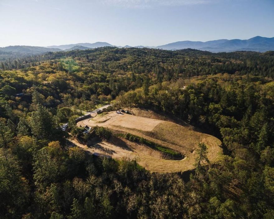 Admirable 5-acre buildable lot located 10 minutes outside of the city of Grants Pass. The lot commands picturesque elevated views to the west and is only minutes from world-class fishing, rafting and hiking along the Wild and Scenic Section of the Rogue River. Septic, electrical and 75GPM well are available on site, as well as a recently cleared and leveled 1.5-acre building pad. Home and Green House Ready!