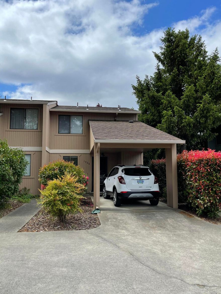 Picture perfect condo.......so close to all services!  This condo is clean and convenient.....two bedrooms, 1 and 1/2 bath with nice kitchen and lots of storage.  Covered parking, heat pump for heating and cooling, washer and dryer included.  Spacious bedrooms with large closets and full bath upstairs. Fenced patio area with storage shed;  also a second storage shed in the front of the unit.