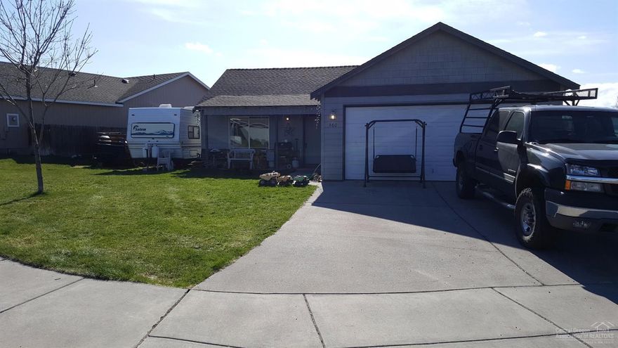 Wonderful starter or rental home in a great neighborhood. Almost 1,200 sq ft. of Single level living with 3 bedrooms and 2 baths, Vaulted ceiling in living room and kitchen, Gas fireplace in living room. Nicely landscaped lot. The fenced backyard has territorial views. Attached 2 car garage with off street, RV parking. Excellent rental since the long term tenant's would like to stay! Hurry on this one!!