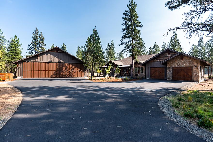 On the market for the first time, this newer custom home is a true Central Oregon beauty to be admired. Located in Eagle Air Estates; a small one-of-a-kind community that offers a private air strip just minutes from all the great amenities Sisters has to offer. High-end detailed finishes include hickory planked wood floors, custom cabinets and custom barn doors. Chef's kitchen features an oversize island, high-end stainless steel appliances and generous storage. Vaulted great room offers floor-to-ceiling stone fireplace with a custom reclaimed wood mantel. Each bedroom has an en-suite including a spacious main level master with spa-like en-suite complete with soaking tub and huge tile shower. Enjoy the outdoor covered patio year-round with overhead electric heaters, fireplace plus wiring for a TV. The heated 3,600 SF hanger/shop is perfect for plane storage or recreational vehicles with a 52' x 12' hanger door. Plus well-appointed guest quarters with full bath and custom kitchen.