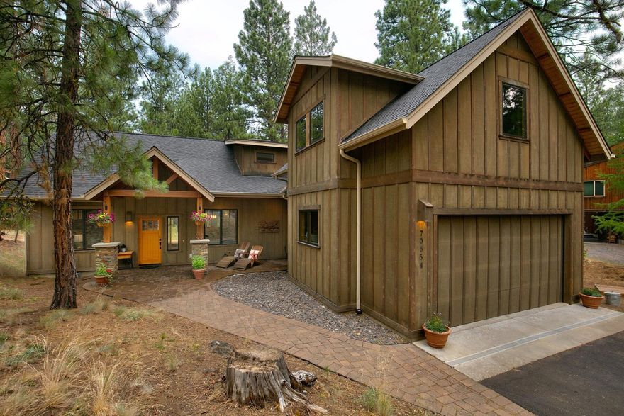 New listing in Black Butte Ranch! On the main floor, you'll find two primary suites, a laundry room, and a kitchen that opens to the great room with vaulted ceilings and a wood burning stove. Upstairs, there's a third bedroom and a spacious bonus room that could serve as a bunk room, an office, or a second living space. This newer build in BBR incorporates wood from the property's trees, giving it a unique charm. The home borders a wooded common area and is conveniently located near the Glaze Meadow Recreation Complex. Whether you're in search of a full-time residence, a second home, or a rental property, this exceptional home in BBR is a rare find!