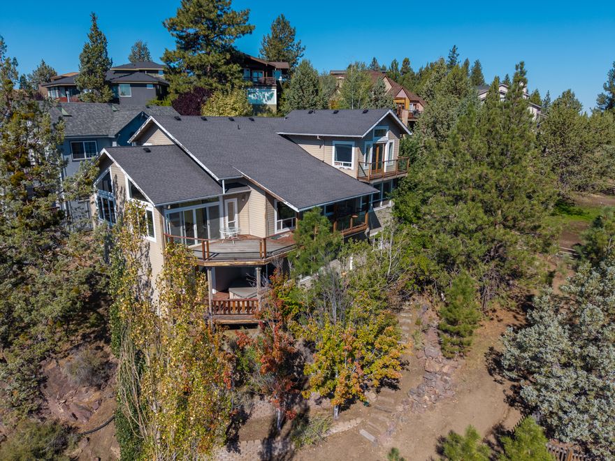 Perched on a spacious .21-acre lot in Bend's coveted Golden Butte neighborhood, this 3,131 sq. ft. home captures breathtaking views stretching from Pilot Butte to Paulina Peak. Vaulted wood ceilings create a warm, inviting feel, while the open kitchen with granite counters and an eating bar is perfect for gathering with family and friends. With 4 bedrooms and 3.5 baths, there's plenty of room to spread out, all while enjoying the beauty and convenience of Bend's southwest side.