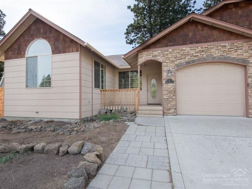 Single Story Town Home with no HOA Dues in the Old Mill District. Easy access to shopping, restaurants and the beautiful Deschutes River. Great Room Floor Plan with vaulted ceiling and gas fireplace. New wide plank laminate in L.R. Granite counters in kitchen. Stainless appliances including fridge & trash compactor. Single car garage with utility sink. Cat 6 wiring/network. Easy living in great location.