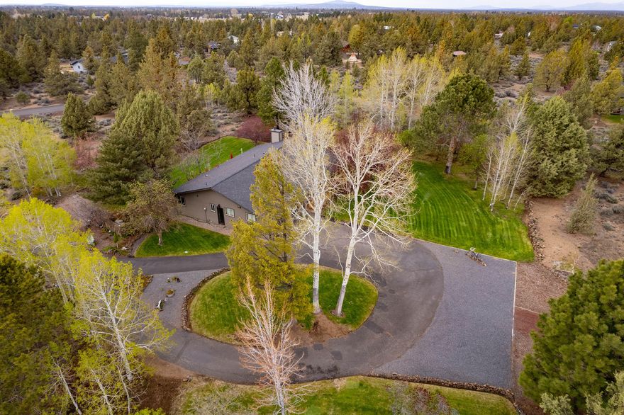 Experience peaceful country living near Bend's city amenities on 4.04 beautiful acres of property in Los Serranos.  This single level contemporary farm house has been meticulously maintained and was recently extensively remodeled inside and outside boasting quality through-out.  New kitchen, bathrooms, hardwood flooring, windows, mud room, roof, siding, HVAC and so much more.  Separate 32' x 48' x 11.5' , 30 amp/220v pull thru shop.  Location is approx. 3 1/2 miles to restaurants, Costco, WholeFoods, Safeway, coffee, parks, & St Charles Medical Ctr.    A must see as this lovely property is truly a dream to be appreciated. SEE VIDEO TOUR