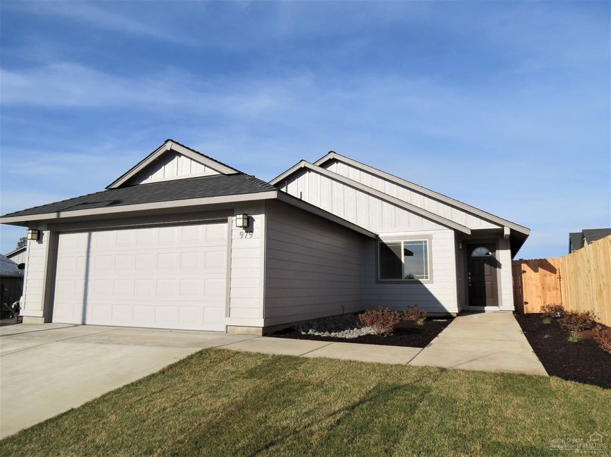 New construction in SW Redmond's Julina Park. 3 bedrooms, 2 bath home in excess of 1500 sq.ft. of living area. Large Great Room opens to Dining and Kitchen, Knotty Alder cabinets with tile counter tops, all stainless appliances. 30 year roof, forced air gas that is AC Ready. Separate utility room. Double car attached garage. Fully fenced, landscaped front and back with sprinklers. Single level home with great curb appeal.