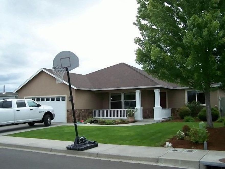 Nice spacious home located in the Woodlake Village Subdivision. This 1484 square foot home was built in 2006 and offers three bedrooms, two baths situated on a nice .18 acre lot. Grounds have been meticulously maintained with a soothing water feature in the front, raised beds in the back yard and still room for the above ground pool and trampoline. Coffered ceilings welcome you into the living area that gives way to the dining area with sliding door to the covered patio. The well designed kitchen has plenty of counter space and eating bar. This home has a split floor plan. Coffered ceilings are also in the master giving the room height and warmth.