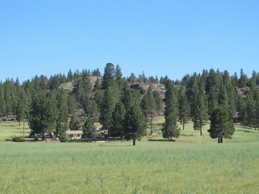 This 100 Acres Would Be A Great Getaway Or To Have A Nice Horse Ranch Totally Fenced And Cross Fenced. In The Past Has Been Planted Into Dry Land Rye. No New Crop Planted. No Other Homes Close. The Home Is A Mobil Home With An Addition. 2 Bedroom 2 Bath. Pine Trees Dot The Property And Nice Big Trees Around The Home. Domestic Well Pumps 300 Gal A Minute