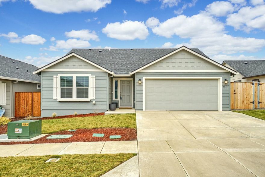 This 2023 built elegantly designed home is of the Edgewood style and consists of 3 bedrooms and 2 full bathrooms with 1,408 sq ft.  It is a single level home providing comfort and an incredibly efficient use of space. A perfectly laid out kitchen with stainless steel appliances, features a breakfast bar and ample counter space that opens up to both the living room and dining room.  The main bedroom provides two large closets as well as an ensuite bathroom with two vanity sinks. The landscaping is complete with in-ground sprinklers and a fully fenced yard.  The current owner had many upgrades put in during construction, including premium snow white quartz counters in the kitchen and bathrooms, as well as upgraded hardware and trim through out the home.  Make this immaculate move in ready home yours today!