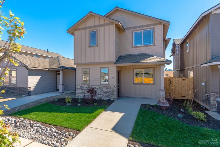 Looking for easy maintenance? This is it! 3 bedroom, 2.5 bath, 1,756 sf of living space including upstairs loft. Lg great room w/fireplace open to Dining & Kitchen w/eating bar. Knotty Alder cabinets, Quartz slab counter tops, SS Energy Star appliances. Tons of counter space & storage. Spacious Master Ste w/ Cascade Mountain Views. Gas forced air w/high efficiency furnace & A/C ready. Double car garage. Front landscaping w/auto sprinklers, fully fenced. Stainless Steel refrigerator & Blinds included! See Model home @ 3095 NW Alder Pl Thu-Mon, 11-4pm