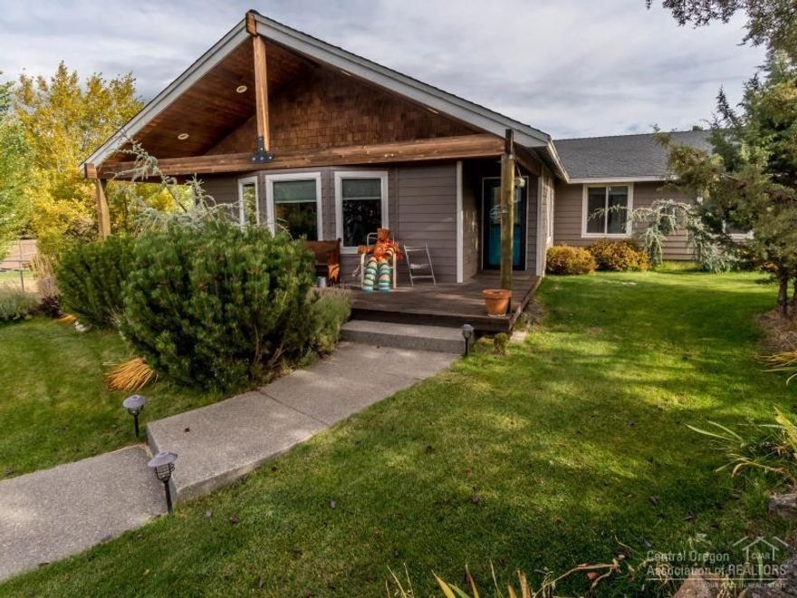 Single level 4 Bdrm charming and well built home on a HUGE lot in the city limits. 3 Bay shop with lots of manicured concrete and room for as much as you can store. This family home has been very well cared for and maintained. Vaulted ceilings, beautiful and grand entry way, septic just serviced and pumped, gated entrance, very serene setting. Come and find this gem inside the city on 0.57 of an acre! Ceiling fans in every bedroom and living room.