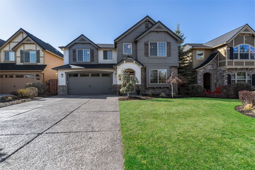 Immaculate home in NE Bend w/ tons of upgrades inside & out! Open plan w/2 story vaulted great room, massive windows, hardwood flooring in the lower-level living area w/ cozy slate surround gas fireplace & built-ins. Open kitchen ftrs breakfast bar, modern black SS appliances included, dbl oven, tiled counters, eating area, outlets above cabinets, under cabinet lighting & more. Upstairs ftrs custom woodwork + an oversized loft/bonus area wired for surround sound. Large primary suite ftrs carpet, high ceilings, tiled soaking tub, double vanities, soaking tub, step in shower, skylight & walk in closet. Addt'l bedrooms share a full bath. Outside is a community owned open space in back for privacy & wildlife, extended paver patio w/natural gas fire pit, bbq connection, auto sprinklers w/drip lines, switched holiday light outlets at roofline. Front yard is HOA maintained! 1 block from the popular 159 acre Bend Pine Nursery Park, schools, breweries, the canal, trails, & min to downtown.