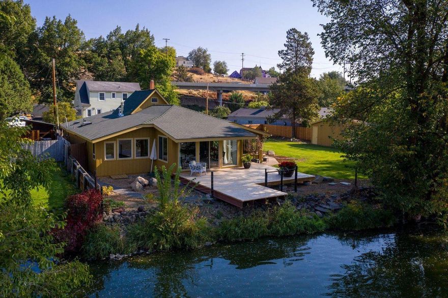 BREATHTAKING VIEWS from this amazing home right on the Link River! Kayak from your backyard or walk to Link River Trail, Lake Ewana,Moore Park and downtown. Sit back on the new deck and enjoy the otters, pelicans, eagles, and blue heron just to name a few. Notice the new landscaping including a fantastic water feature from a natural spring on the property and a on site garden house/shop that has lights and heat. Also updated kitchen appliances and a great open flow floor plan! It has a small loft upstairs that is currently being used as an office, but you could easily add another bed if you wanted. It's tucked off of the road and nestled up right on the river which makes it feel like you are off on your own but really centrally located . This is definitely one of those must see to appreciate homes. Let me know when you would like to take a look!