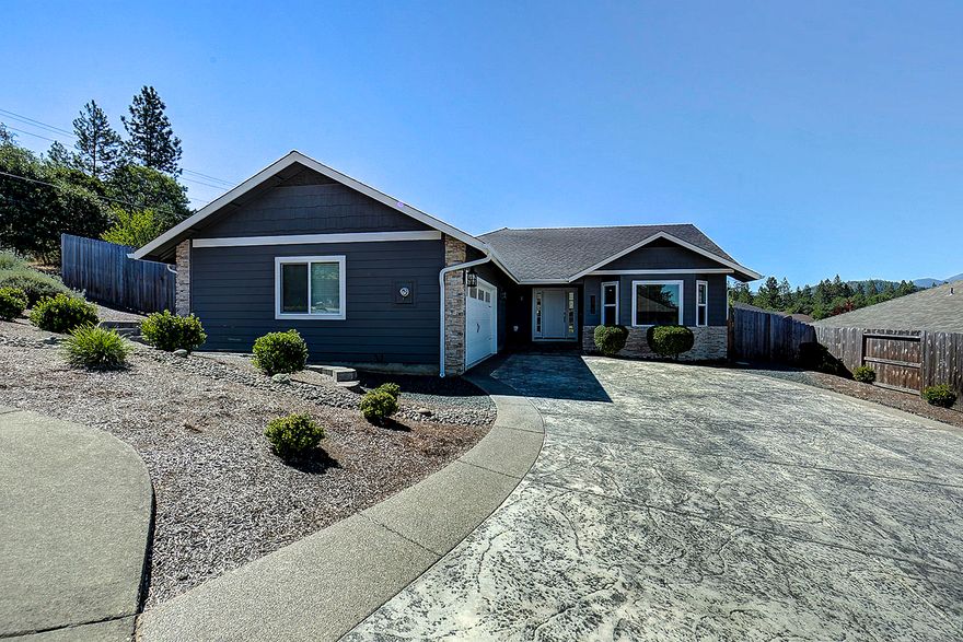 Beautiful Kirk Chapman Home in desirable neighborhood!  Built in 2016 this custom-built home features 3 bedrooms, 2 bathrooms, approx. 1862 sqft., an open floor plan with vaulted and coffered ceilings, gas fireplace, ceiling fans and hardwood floors. Kitchen is gorgeous with stainless appliances, Corian countertops, cabinets with pull-outs, gas range, convection oven and lots of counter space.  Nice master with slider to covered patio, master bath with double sinks.  Attached oversized 2 car garage. Fenced backyard with pathway along the home to covered back patio with ceiling fan.  Subdivision living in the country!