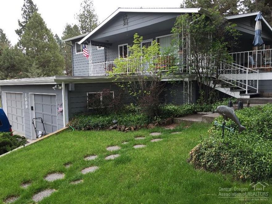 Great 4 bedroom home tucked away on a quiet cul-de-sac. Open kitchen, dining & living floor plan w/ separate family/media room. Tile & glass showers & tile bathroom counters. Full local stone wood burning fireplace hearth. Warm up after a day of skiing next winter. 2,128 sq. ft. on a large .21 acre lot. Updated utility room, tile floor large mud room w/a cabinet & drawer for everyone! Updated windows. Enjoy the decks, BBQ, watch the fireworks from your deck, relax in the hot tub. Peaceful water feature.