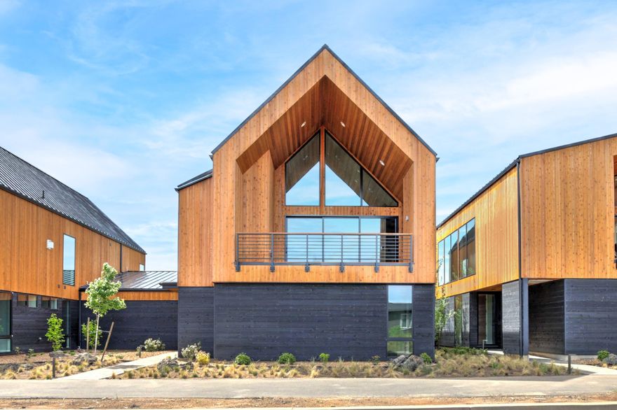 Beautiful, new construction and MOVE in READY  townhome with mountain views.  The reverse living plan features clean lines and modern, European design elements throughout. Primary suite is on main level with  soaking tub, well designed walk in closet & private laundry.  Open and spacious great room features vaulted ceilings, gas fireplace, floor to ceiling windows and panel glass sliding doors allowing for indoor-outdoor living and entertaining. The well appointed kitchen features Thermador appliances, pantry, island sink and breakfast bar.  Guests will enjoy two additional full suites and laundry room on the entry level.
Chalet is conveniently located steps from the owner's pool and all of the amenities of Tetherow Resort. Easy access to dining, miles of hiking, biking trails, and Mt. Bachelor.
Upgrades include enlarged suite on entry level, hardwood stairway and outlet for car charge. Third bay garage wired for heating unit allowing for a flex space. Deck wired for overhead heating.