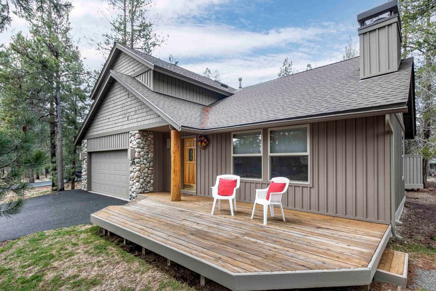 This stunning property boasts 4 bedrooms & 3.5 bathrooms. Situated on a quiet cul-de-sac, this home has been completely updated in 2019, providing a modern & sleek aesthetic that is sure to impress. You are greeted by a spacious great room w/ a gas start wood burning fireplace - the perfect spot to cozy up w/ loved ones on chilly evenings. The hickory hard wood floors add a warm touch to the living space. The primary bedroom is conveniently located on the main level, providing ultimate comfort & privacy. Upstairs, a second primary bedroom awaits, along w/ two additional guest bedrooms & a bathroom. The kitchen is a chef's dream w/ its large island & ample counter space, all featuring stunning quartz countertops. The pass-through window in the kitchen offers a seamless flow to the enclosed back deck, making it an entertainer's paradise. The enclosed hot tub area adds a tranquil oasis to unwind. For those with an active lifestyle, you'll love the enclosed storage area for all your gear.