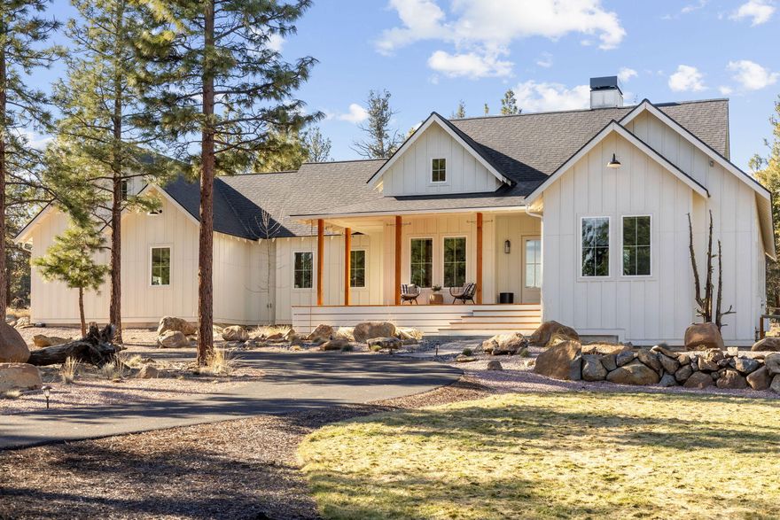 BACK ON THE MARKET! Previous Buyers' Financing Fell Through - Seize Your Second Chance at This Stunning Custom-built, Modern Farmhouse on 2 acres. Single-level with 3 bedrooms + office, 10-foot minimum ceilings, and vaulted spaces in the office, primary bedroom, and living room. The gourmet kitchen boasts high-end appliances, 6-burner gas range w/ pot filler, quartz countertops, large island, custom cabinetry, and a spacious butler's pantry w/ bar sink. The primary bedroom offers large windows, a walk-in tile shower, 2 walk-in closets, and a double vanity. The living room centers around floor-to-ceiling moss rock fireplace w/ wood-burning & gas lighting options. Additional features include a large laundry/mudroom with a sink and a 3-car garage w/ work bench. The exterior is an entertainer's dream w/ covered patio, an outdoor TV, gas fire pit area, kids' playground, front & back irrigated lawn, circular paved driveway, shed with storage racks, and space for a future shop/RV area.