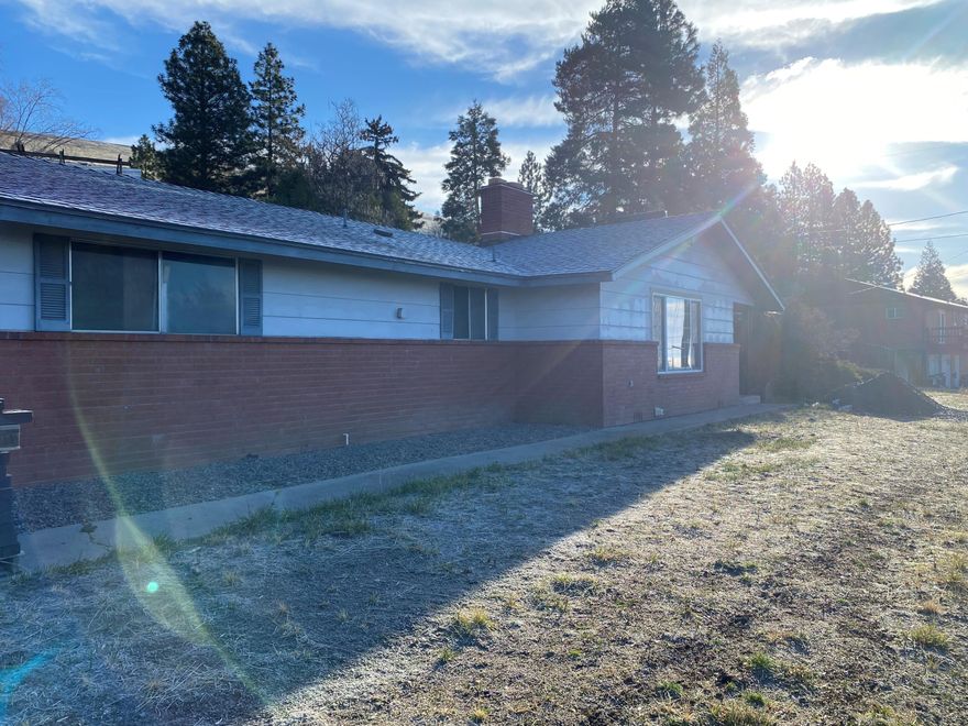 Moyina heights home!!   Great big lot on .25 acre.  Double car garage and a small shop/office building.   A nice open floor plan with a two way firplace between living room and family room.   Home sits on a corner lot and is raised up from street level.  A must see!!