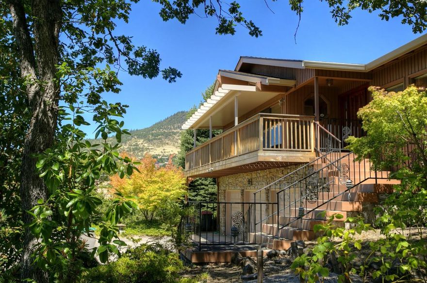 Views! Views! Pagnini built: wood windows skylights, T&G living rm vaulted ceiling, 2 gas insert fireplaces, 2 tankless water heaters and two heat pumps 2010. All main floor living w/ separate living, formal dining, eat in kitchen, office plus 3 large beds. 2 full baths, 2 half baths, office, 3878 sq ft main floor, 952 sqft, full stand-up finished/unfinished basement is a shop w/ plumbing, a dog wash sink, massive storage, and a 726 sqft-car garage. Front and rear decks, easy walk out to the backyard. Large rooms. See virtual tour! Flooring: laminate in kitchen only, wood, carpet. Interior features: designated space for dumb waiter for garage to kitchen.