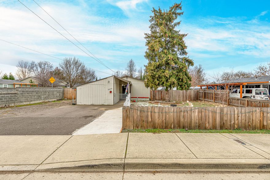 Looking for a lot of square footage at an inexpensive price that is close to everything Medford has to offer? If so, this is the one for you! This charming property features 3 bedrooms (including a large master bedroom w/ a walk-in closet), 1 spacious bathroom, 1433 sq ft, attached 1 car garage, RV parking, large .2 acre lot w/ a private deck, vaulted ceilings, and much more! With ample amounts of parking and yard space, this is the perfect property for a family that needs a lot of room for entertainment! Kitchen is large enough for 2 or more to chef it up and dining area can fit a large gathering as well. So much space for such an inexpensive price, so contact your agent today for a personal tour, before it's too late!