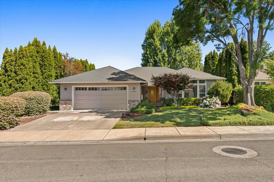 Charming, Move-In Ready Home in Desirable Larson Creek!  Located just minutes from shopping, dining, and top medical facilities, this beautifully maintained 3-bedroom, 2-bath home offers the perfect blend of comfort and convenience. The open floorplan boasts tall ceilings, and a cozy gas fireplace with brick surround in the Great Room.  The Kitchen features stainless appliances, lots of counter space and ample storage with a pantry and linen closet in the adjacent hallway.  The spacious Primary Suite has views of Roxy Ann, walk-in closet and Bathroom ensuite including a 6' soaking tub, and new, cultured marble Shower in 2023!  Slider off the dining room to the covered back patio opens to a lush, private backyard—ideal for relaxing or entertaining. Enjoy peace of mind with numerous recent updates including a new roof in 2018,  Air Conditioning unit and Gas Furnace in 2020, and Water Heater 2024.  Don't miss this gem in one of the area's most sought-after neighborhoods!