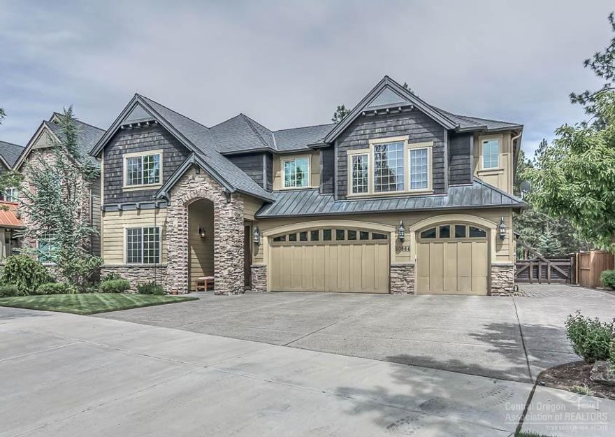 Enjoy living in the heart of the city with serenity of a park like setting & shop! Lovingly maintained & beautifully appointed home, interior boasts towering ceilings, lots of windows to capture sunlight and hardwood floors throughout. Perfect for entertaining, home showcases great room, bonus room, office & 5 bedrooms centered around chef's kitchen. Expansive paver patio captures peaceful views of naturescape and fully finished shop makes room for recreational equipment/hobbies, and possible guest suite!