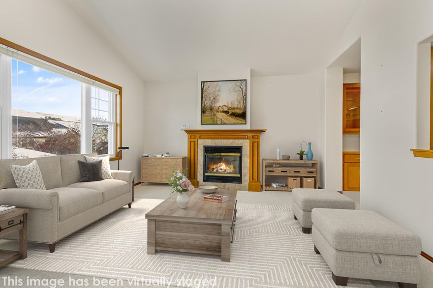 Fabulous top floor condominium with Cascade Mtn. views galore!  Vaulted ceiling, skylight and solar tubes for natural light and windows on three sides of this lovely 3 bedroom, 2 bath home.  Large tile entry, third bedroom with French doors and hardwood floor.  Primary bedroom with windows for natural light and views of the hills near Ashland, large walk in closet and bathroom with low step in shower.  Kitchen with granite counter tops, pass thru window to enjoy the mountain views while cooking, easy access the formal dining area and large laundry room.  Beautiful wood doors and trim throughout this custom designed, one of a kind floorplan in Mountain Meadows.  Triple paned windows in dining area and living room provide quiet from the outside world. Living room with gas fireplace, vaulted ceiling and three large windows to take in the mountains and Grizzly mountain too.  Assigned parking and storage in lower level of building accessible via stairs or elevator.  Must see this one!