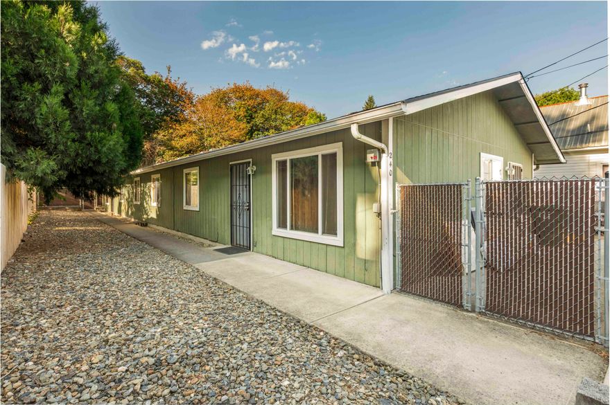 Spacious duplex, both units identical with 3 bedrooms and 2 full bathrooms each. Conveniently located within walking distance to shops and restaurants. Live in one unit and rent the other. Washer and dryer hookups and both units are currently rented.