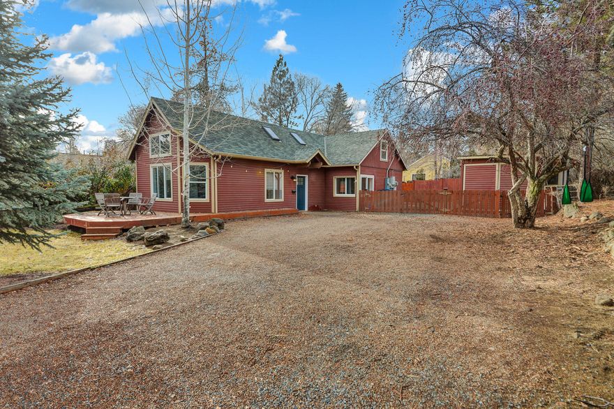 Adorable Westside Bend Chalet with transferable Short Term Rental (STR) permit.  Tucked away in a private cul-de-sac location, this charming home is a ''guest favorite'' on Airbnb, garnering a 4.92 out of 5 stars rating from 300+ reviews.  Lovingly updated throughout, this special property could be continued as a rental, or also offers creative opportunities due to the spacious .20 acre double lot.  Quiet private location at the end of 3rd Street, yet close to downtown, the river trail, 1st Street rapids park, and all of the Westside Bend amenities.  Large front deck for outdoor relaxation on a warm summer night.