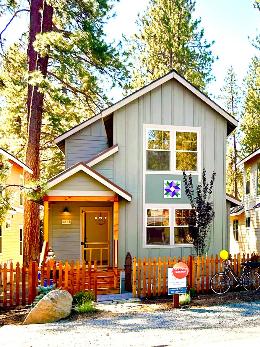 Newly built custom home in western-themed Sisters, Oregon. No HOA fees. Features a flexible floor plan with potential lock-off studio and private entrance—ideal for long-term rental. Main level includes tiled propane fireplace with granite hearth, Acacia wood eating bar, quartz countertops, custom Kibak tile, large pantry, and storage room. Powder room located away from living areas. Attached single-car garage. Upstairs offers plush carpet, custom stair railing, open loft/bonus space, two bedrooms, and a full bath with 6' soaking tub. Additional upgrades include solid-core doors, tiled step-in shower with Pebblestone flooring, heat pump, extra insulation, paver stone driveway/walkway, and vintage-style gate. $5,000 seller credit toward mortgage rate buy-down.