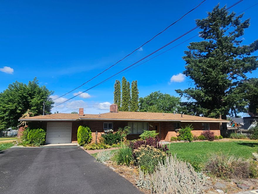 Cute 3 bedroom 1 bath home on 1.21 acres with a workshop/barn! This one has all of the elbow room you need with a enclosed patio to sit back and take it all in....would also make for a perfect greenhouse. Take a breather out in the cute gazebo area and enjoy the mature trees and fresh air. Feels like you are out in the country although you are right close to everything you need. The house has pretty original hardwood floors, roof is only a little over a year old but there is still some room to do some updates and make it your own.