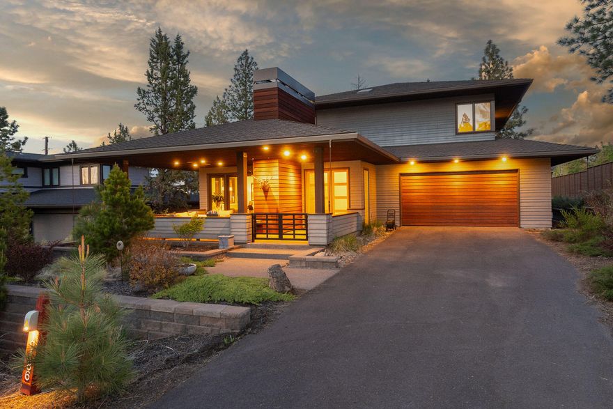 Nestled in the exclusive Three Pines community, this beautiful custom home combines exquisite craftsmanship w/ modern amenities. The kitchen is a chef's delight, featuring Jenn-Air appliances, new Bosch induction cooktop & Ceasarstone quartz solid surface counters. The adjacent dining room boasts elegant coffered ceilings. The primary bdrm is conveniently located on the main floor. It features an extra-large closet, heated tile floors, & a large tiled shower. Upstairs, all 3 bdrms boast walk-in closets. This home is a smart home, w/ media sound throughout the first floor & outside,  you will easily be able to control your home's entertainment system from your SmartPhone. The home comes w/ an Earth Advantage Cert., showcasing its commitment to energy efficiency. Additionally, the outdoor patio features a fireplace, creating a cozy & inviting atmosphere. With quick access to Shevlin Park, shops, restaurants & entertainment, you'll have everything you need right at your doorstep.