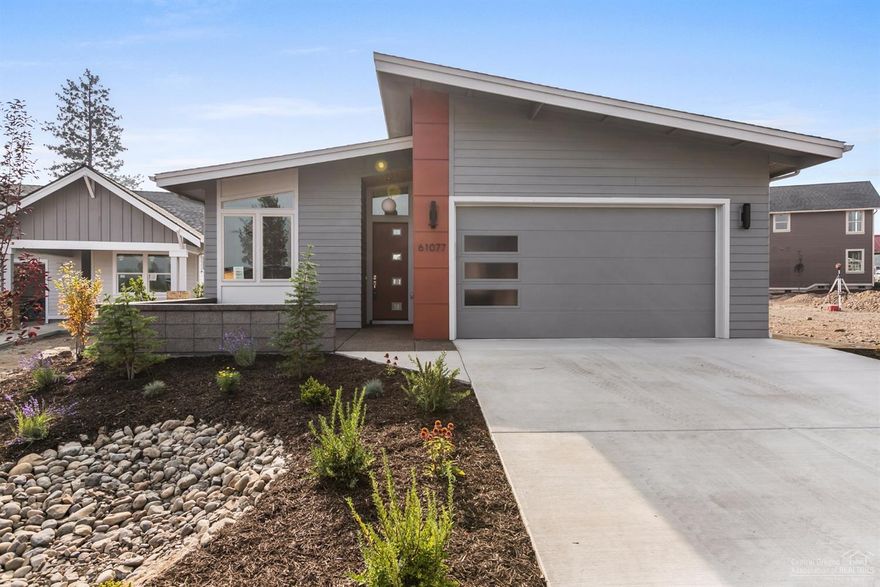 This contemporary Earth Advantage Certified home is the perfect addition to The Hidden Hills Neighborhood. Three bedrooms, two full baths built by award winning JD Neel Construction. Home features a spacious master suite with high-end finishes throughout. Pre-plumbed and wired for A/C .