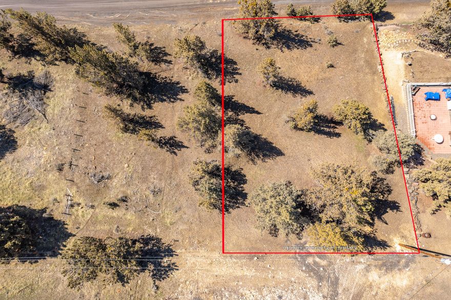 Located in the unique community of Ochoco West & just 20 minutes North of Prineville, this .21 acre lot is available for your personal vision. Community water/sewer, power available, and garbage service. Zoned R5 (Rural Residential). Community amenities include over 1200 acres of private land to explore, a pool, private lake stocked for fishing, horse stables, shooting range, & more.