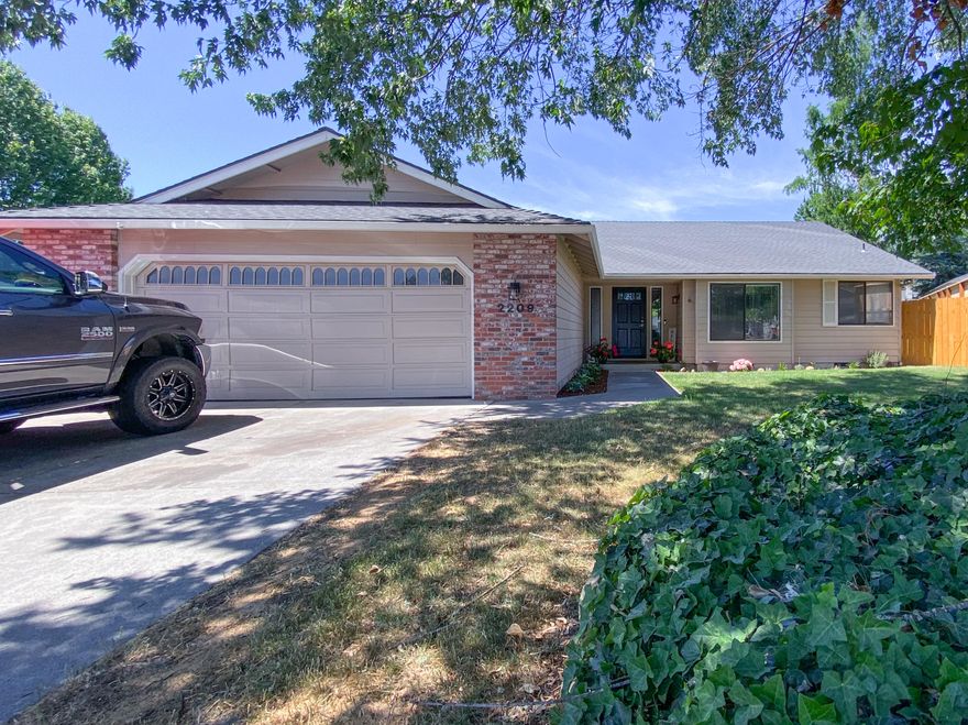 Move-in ready single-level home nestled on a quiet cul-de-sac! The floor plan features an open, light-filled main living area. A vaulted living room offers a fireplace and slider to the patio. The kitchen provides an island with a range/oven, as well as ample prep and storage space, plus an adjacent dining area. Large master bedroom suite with his and her closets. Newer roof, flooring, HVAC, water heater and fencing. Two-car garage plus RV parking. Spacious, fenced yard.