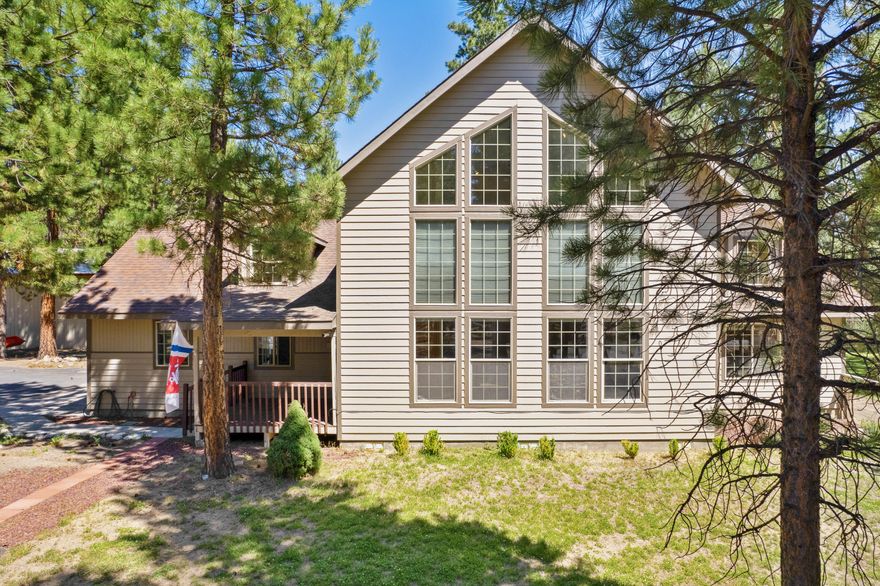 Gorgeous custom Northwest style home in Ponderosa Pines on 1.25 acre corner lot and close proximity to public land.  Window wall & rock fireplace make for a dramatic entrance into the vaulted living room that makes you feel like you could be on vacation forever.  Main level boasts a spacious primary suite with a jetted tub and separate shower.  Two bedrooms, full bath w/ shower tub combo and bonus room are upstairs. There are many special touches and wood accents to appreciate in this home along with an oversized 624 sq ft garage. Large deck, fenced yard with a green house next to 30'x40' shop make the possibilities endless for this beautiful property that you can call your own!