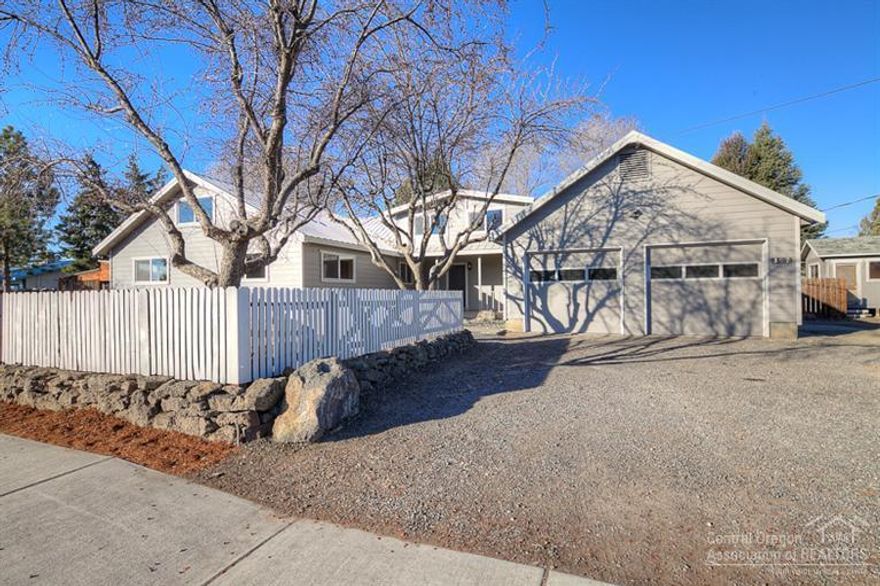 Enjoy nearly an acre in town! Located on a corner lot in NW Redmond, you'll find some of the perks of living in the country - just minutes from downtown. Lg enough to accommodate your family & friends & pets too! Renovation just completed & it's ready to go. Huge kitchen w/tons of storage, new appliances. Family sized utility room w/sink. New flooring, exterior & interior paint. Covered patio & deck, fenced backyard that backs up to canal. Double attached garage, shop & barn - bring RV & toys! Subdividable