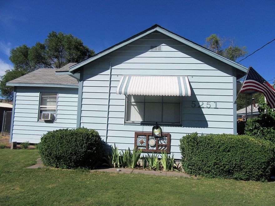 Great south suburban location close to Wiard Park. Featuring  2 bedrooms, 1 bath, exterior paint 3 years old, good composition roof, Gas F/A furnace, all appliances stay, deck, tandem 2 car garage, workshop with 110V, KID irrigation, all on .22 acres and fenced in back.