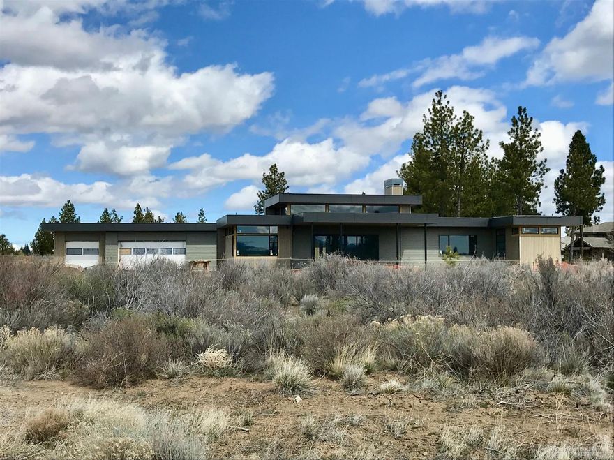 Bend Trend Homes brings this stunning single level NW contemporary design for a discerning buyer looking for unsurpassed quality and design. The efficient design is open and flowing with loads of light, accordion glass walls, top of the line finishes and features, three suites, office/flex space. Exterior living space is paramount in this home with courtyard and covered terraces. Photos are of a similar home by Bend Trend and Design Haus.